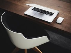 The hand rail is going a little faster than the moving sidewalk.